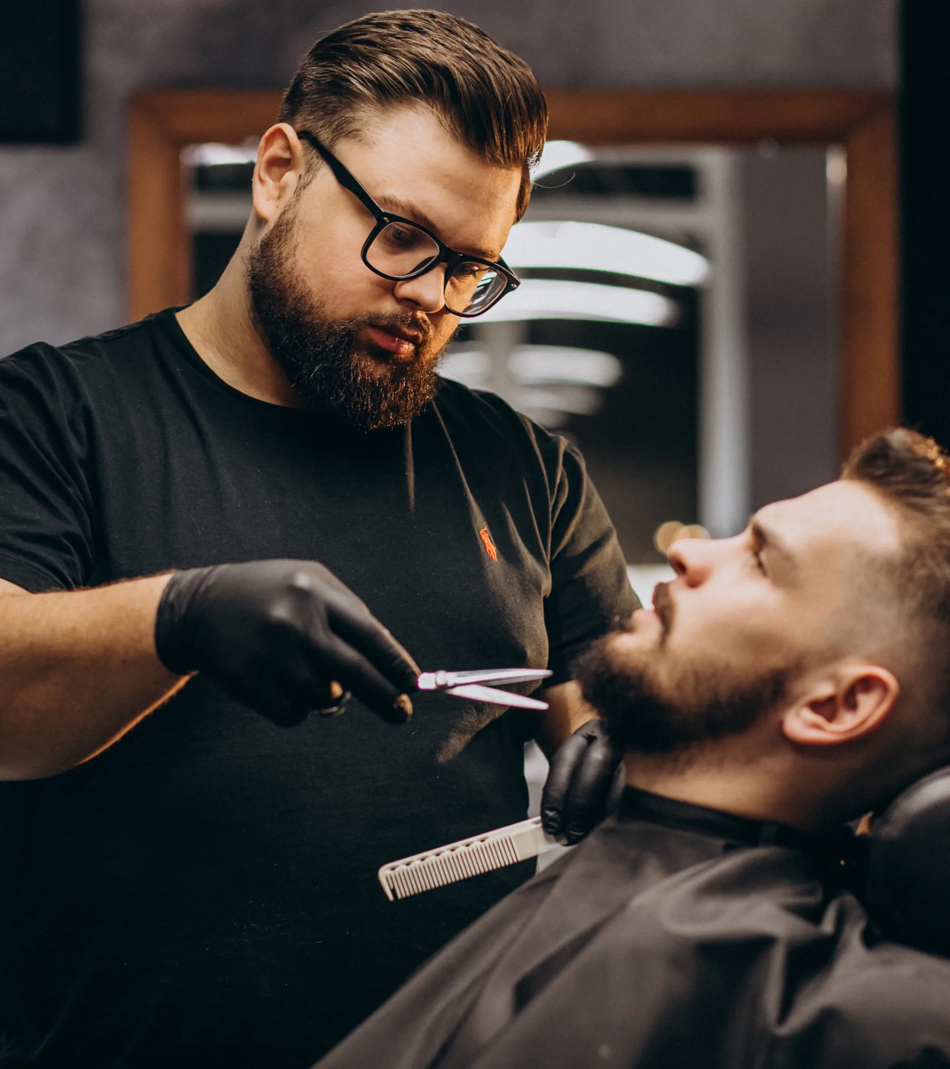 beard trimming in barbershop photo